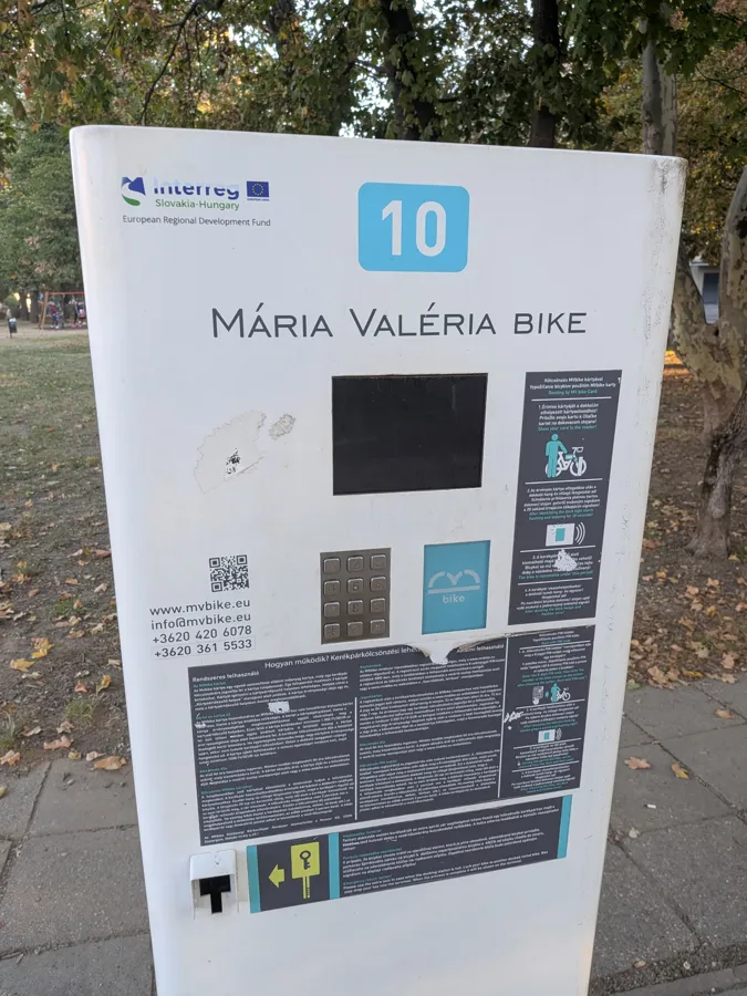 A Mária Valéria Bike rental terminal, dock number 10, in a park